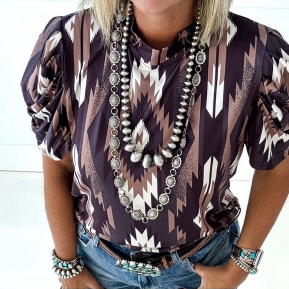 a high neck line and uniquely designed bubble sleeves
94% Polyester 6% Spandex - Picture 1 of 4